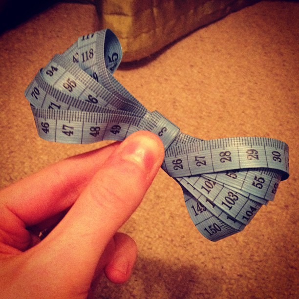 Getting crafty with a tape measure, I turned it into a bow. 